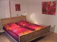 Zimmer mit Bett